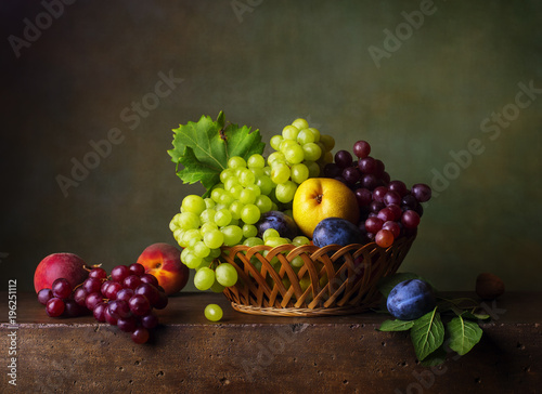 Still life with pears  grapes and plums