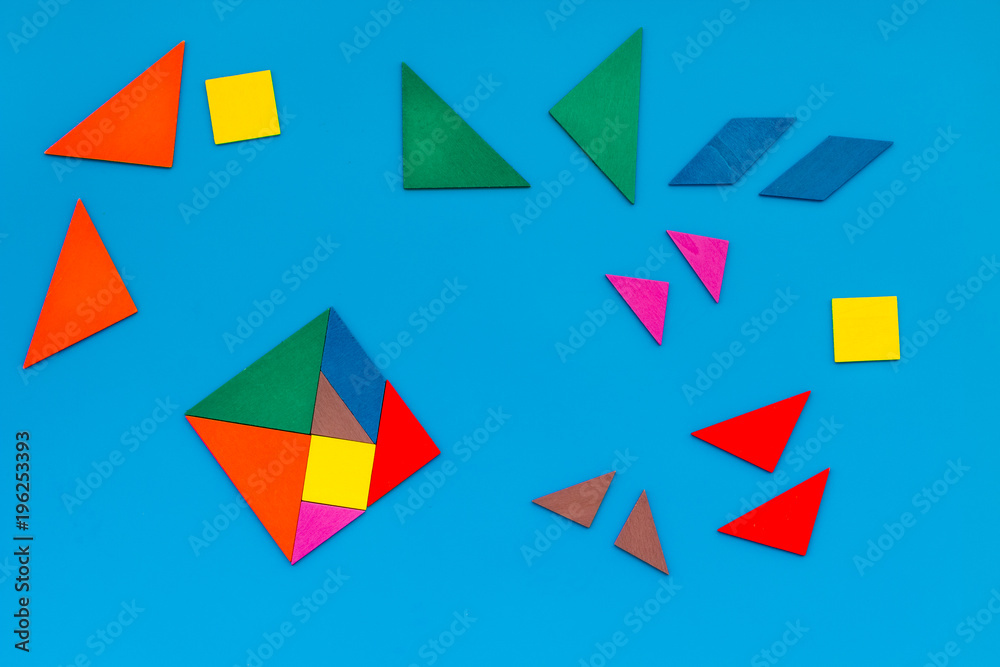 Business solutions, success and strategy. Puzzle with paper pieces office desk blue background top view pattern Business solutions, success and strategy. Puzzle with paper pieces office desk blue background top view pattern