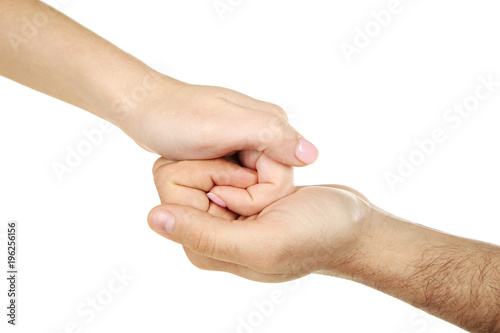 Female and male hand holding each other on white background