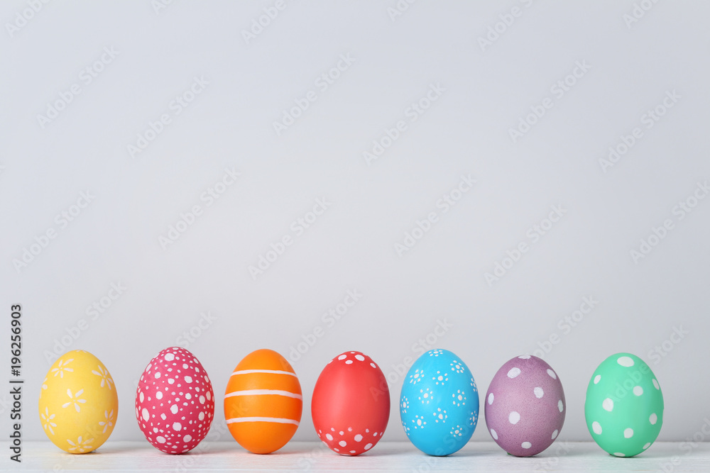 Colorful easter eggs on grey background