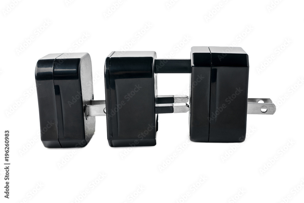 Three black adapters for American and European plug on white isolated background Three black adapters for American and European plug on white isolated background