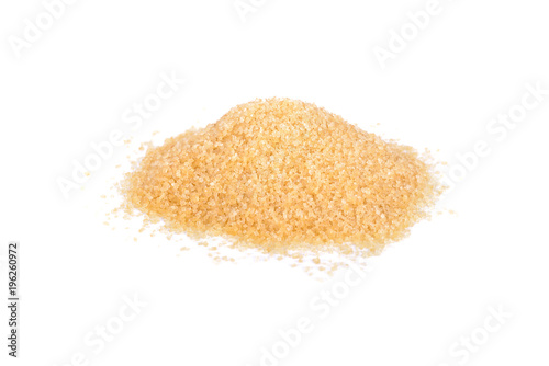 pile of unbleached tiny cube brown sugar on white background