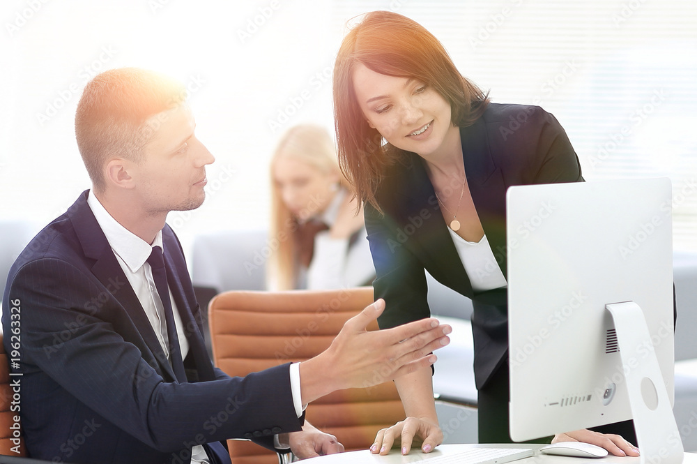 employees discussing business issues in office employees discussing business issues in office