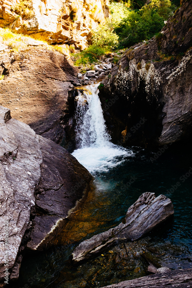 Obraz premium Waterfall in the mountains, Alpe Devero, Piedmont, Italy