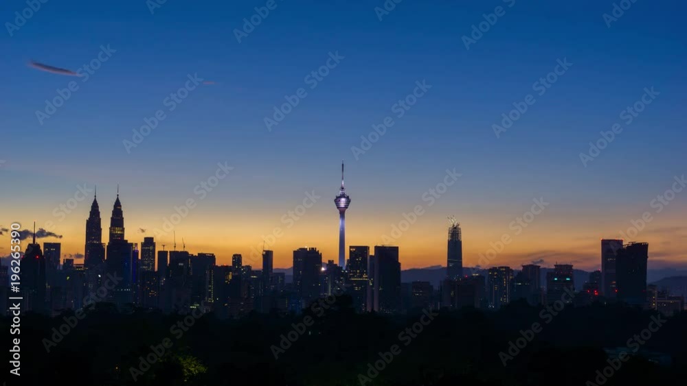 Time lapse of sunrise over downtown Kuala Lumpur, Malaysia Time lapse of sunrise over downtown Kuala Lumpur, Malaysia