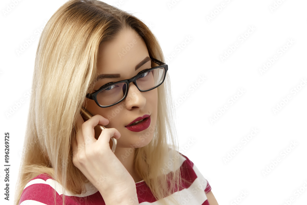 Beautiful young woman talking by mobile phone on light background