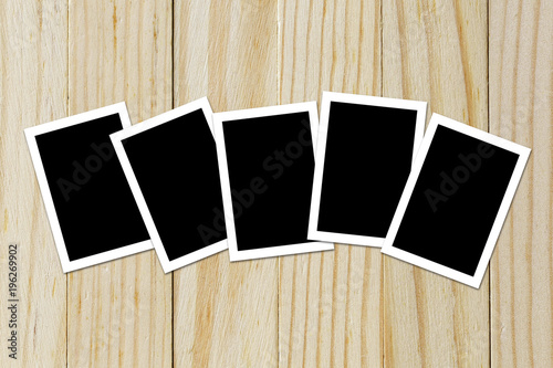 Photo frame blank on wood background with space