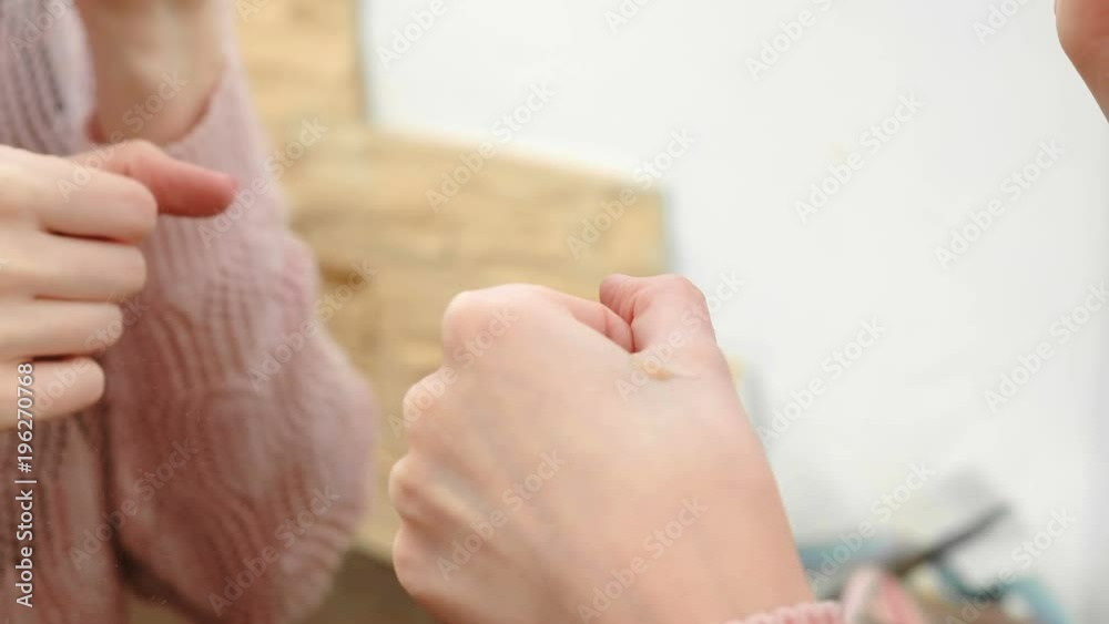 custom made wallpaper toronto digitalCloseup woman's hand put the tonal cream on the face with brush to do a makeup before the mirror.