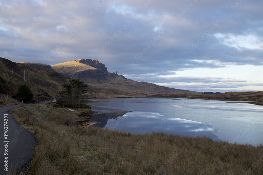 Ice at the Loch Fada and reflections of Old Man of Storr