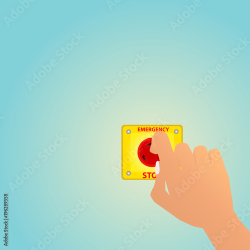 Hand pushing on the emergency stop button