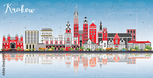 Krakow Poland City Skyline with Color Buildings, Blue Sky and Reflections.