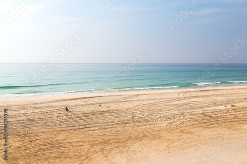 in oman arabic sea sandy beach