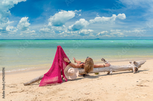 Woman resting on the beach at Klong muang Thailand