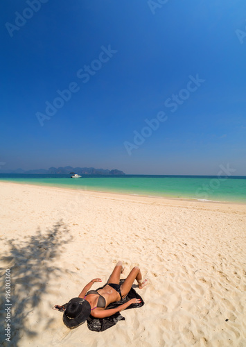 Fototapeta Naklejka Na Ścianę i Meble -  Woman at the beach in Koh Poda island Thailand
