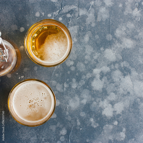 Two glasses of glass of lager beer, top view, copy space