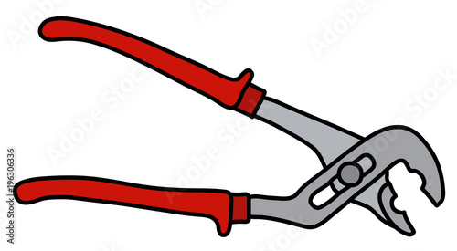 The wrench with red plastic handles