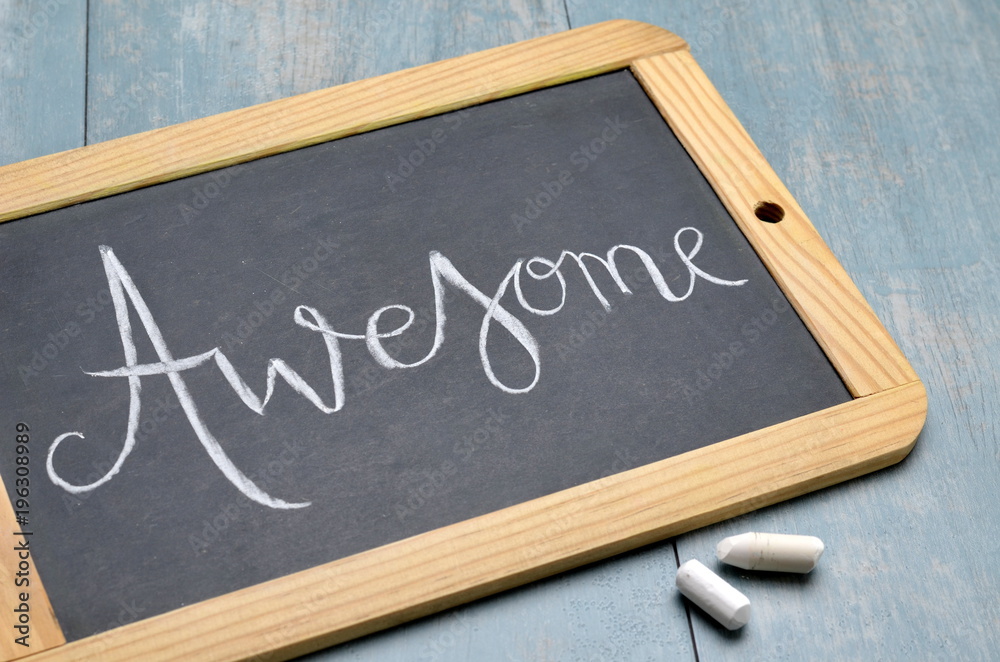 Fototapeta premium AWESOME written on blackboard