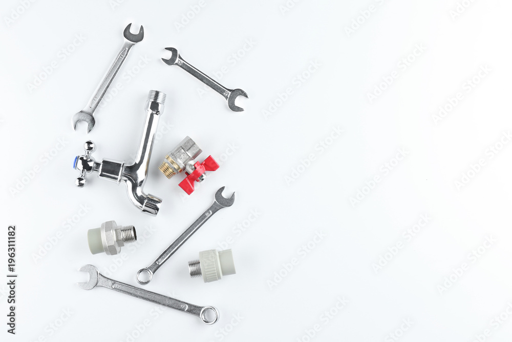 Plumber's items on white background Plumber's items on white background