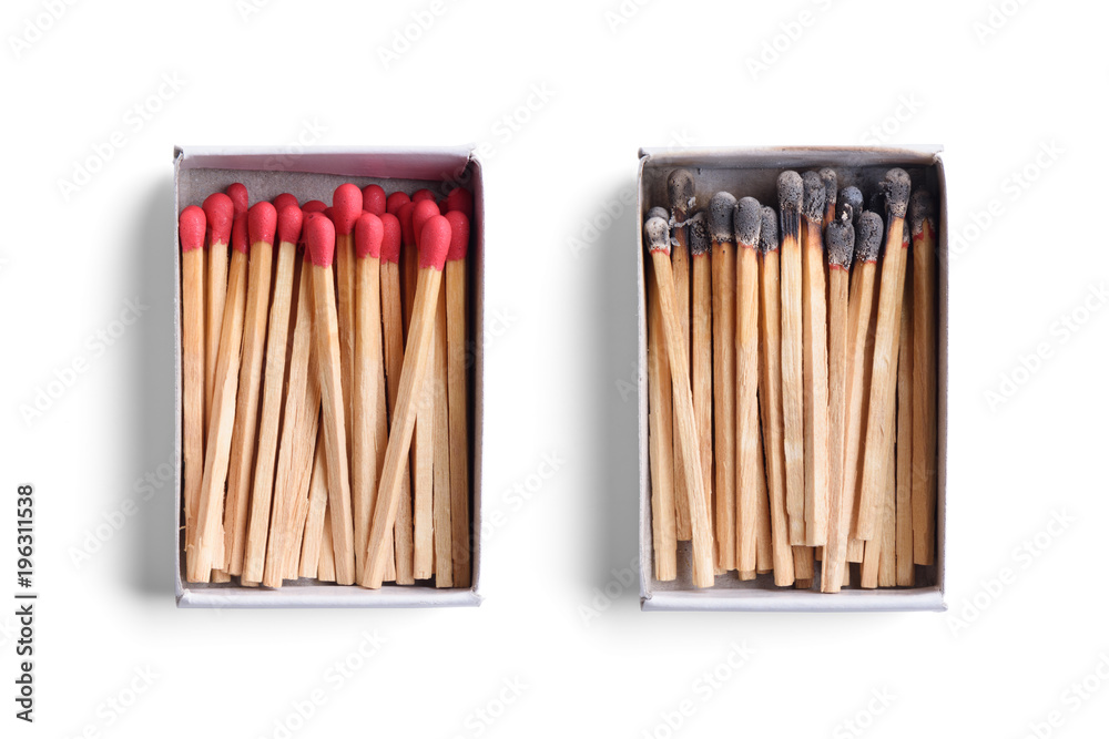 Top view of opened match boxes with burned matchsticks. Isolated on white background Top view of opened match boxes with burned matchsticks. Isolated on white background