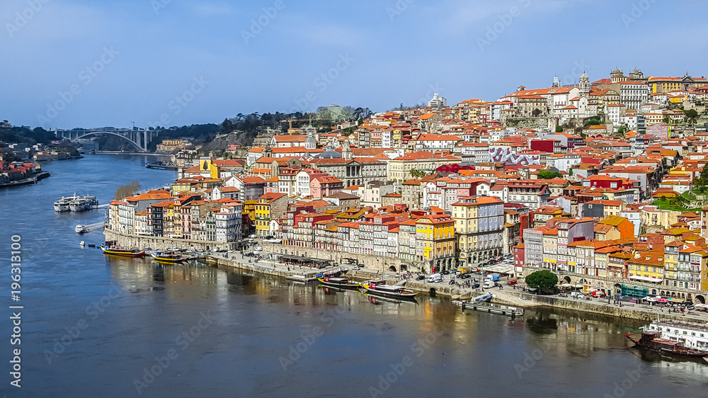 Panoramic view of downtown of Porto, Portugal with Dom Luis I Bridge over Douro River.