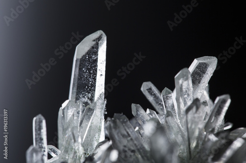 Big natural double quartz crystal isolated on white.