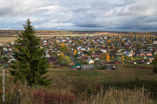 view of the village on a cloudy day in autumn