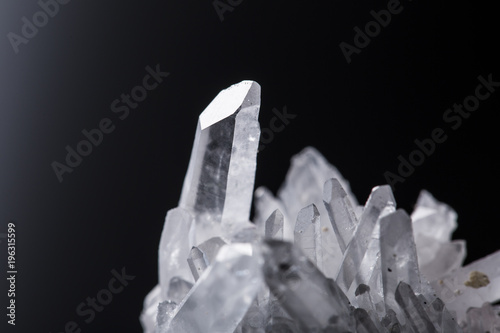 Big natural double quartz crystal isolated on white.