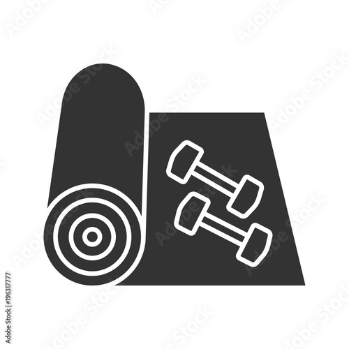 Training mat with dumbbells glyph icon