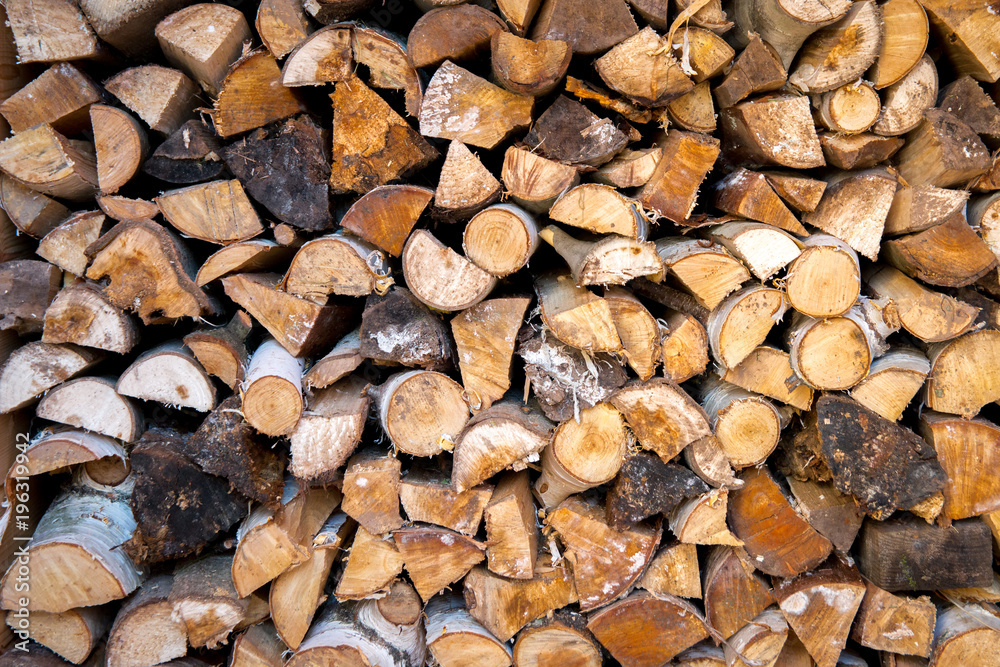 Pile of dry stacked firewood for winter Pile of dry stacked firewood for winter