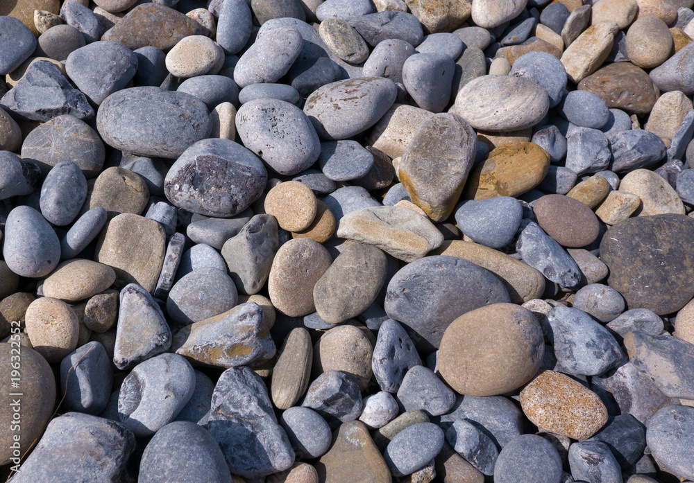 Smooth pebbles on the Irish coast of Atlantic Ocean Smooth pebbles on the Irish coast of Atlantic Ocean