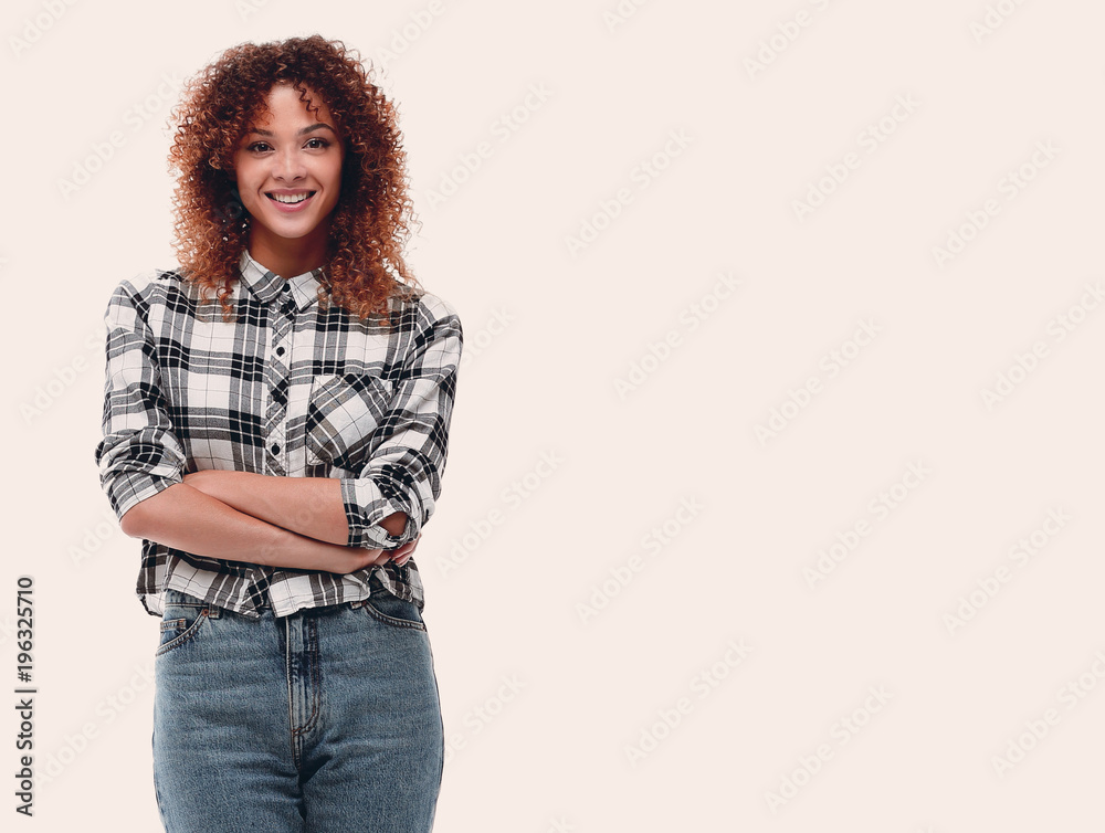 confident young woman in plaid shirt confident young woman in plaid shirt