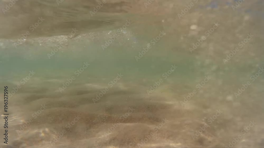 sand rises underwater with a wave sand rises underwater with a wave