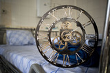 old mechanical clock on the background of medical chamber