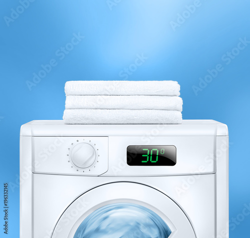 washing machine and towels photo