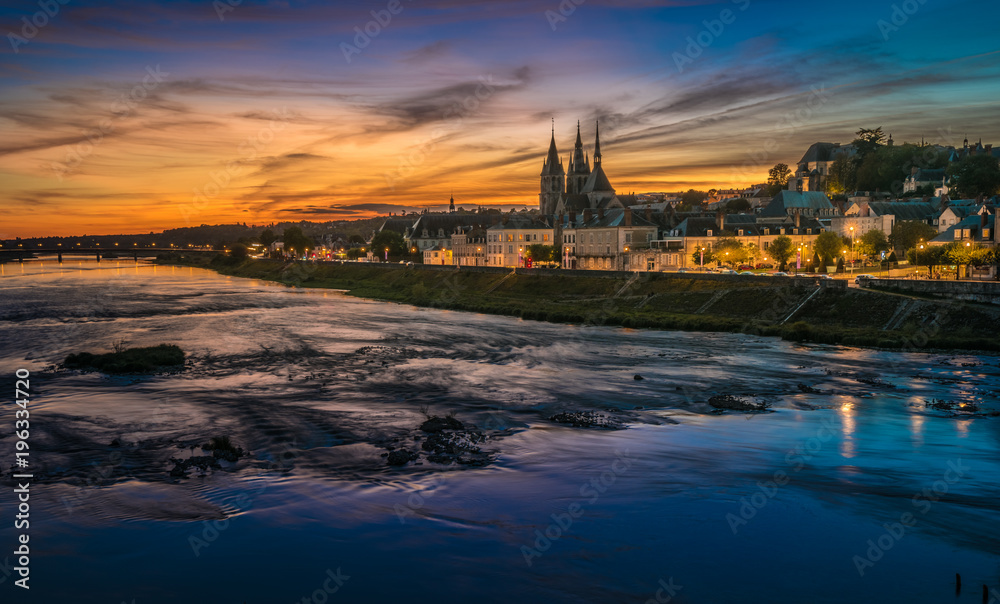 Naklejka premium Sunset image of Blois and the Loire River, France