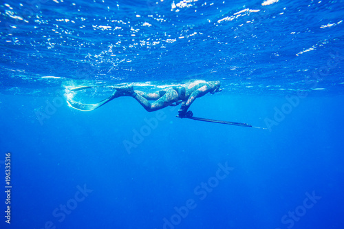 spearfishing in ocean photo