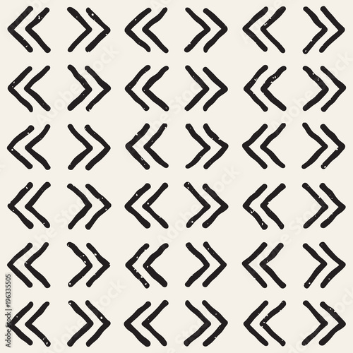 Hand drawn style ethnic seamless pattern. Abstract grungy geometric background in black and white. © Samolevsky