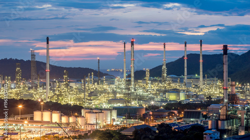 Beautiful sunset  petrochemical oil refinery factory plant cityscape of Chonburi province at night    landscape Thailand