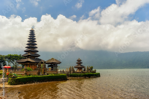 Ulun Danu Bratan water temple in Bali built in traditional architectonic style and Bratan lake, Indonesia
