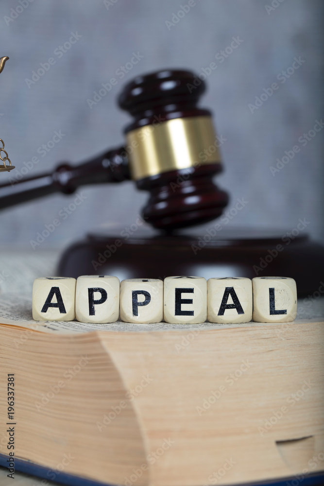 Word APPEAL composed of wooden letters.