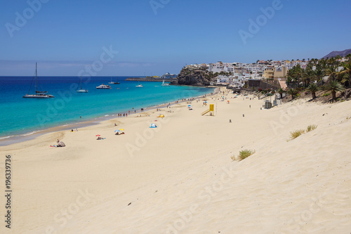 Sand dune and coastal promenade along a beach in Morro Jable town  Fuerteventura  Canary Islands  Spain