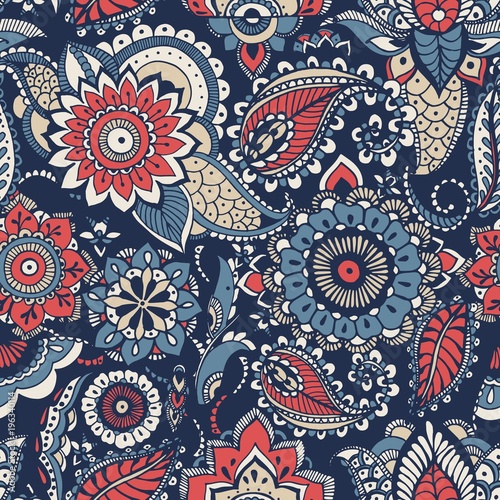 Floral paisley seamless pattern with colorful folk oriental motifs or mehndi elements on blue background. Motley decorative vector illustration for textile print, wallpaper, wrapping paper, backdrop.