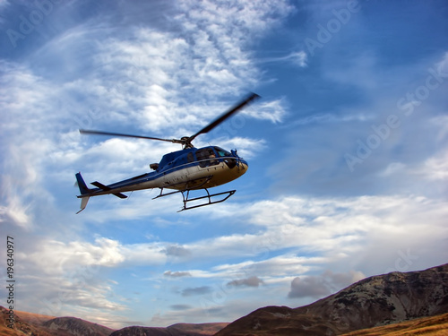 Helicopter above the mountain