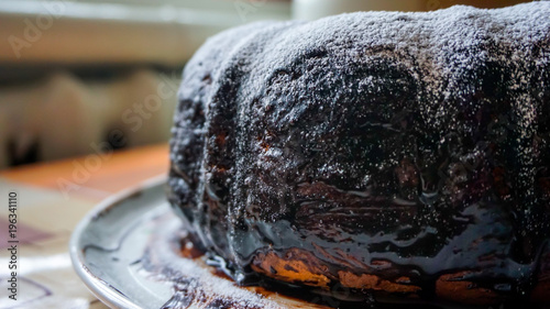 Chocolate cake with sugar powder on top