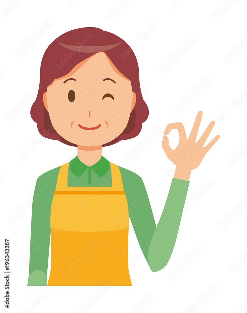 A middle-aged housewife wearing an apron is playing an okay sign A middle-aged housewife wearing an apron is playing an okay sign