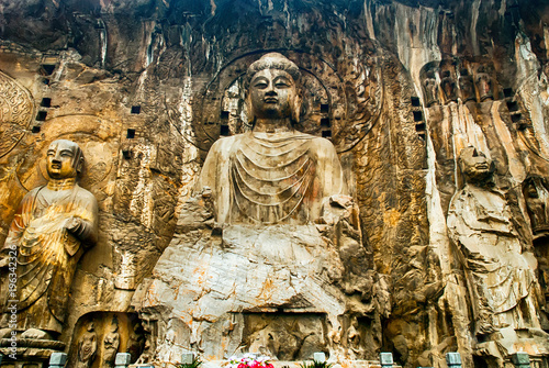 LUOYANG, CHINA - OCTOBER 28: Visitors at Longmen grottoes on October 28, 2007.It is one of the four notable grottoes in Luoyang,Henan,China . A UNESCO World Heritage Site. photo