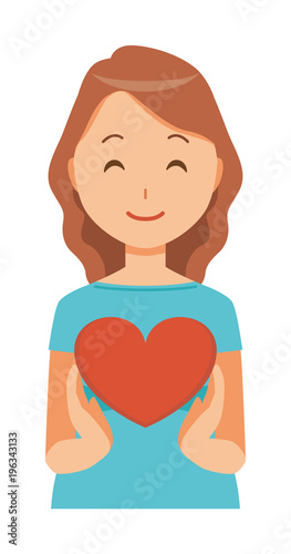 A pregnant woman wearing green clothes has a heart mark