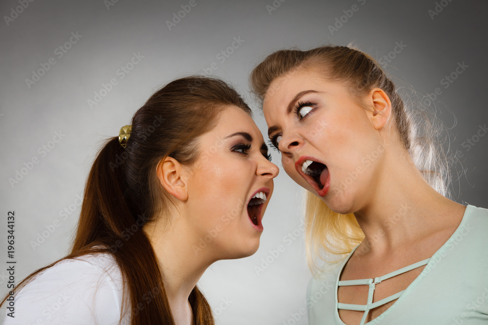 Two agressive women having argue fight Two agressive women having argue fight