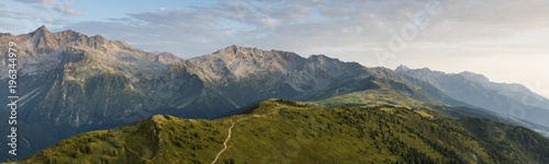 aerial image of green meadows in a mountain landscape at Isère photo