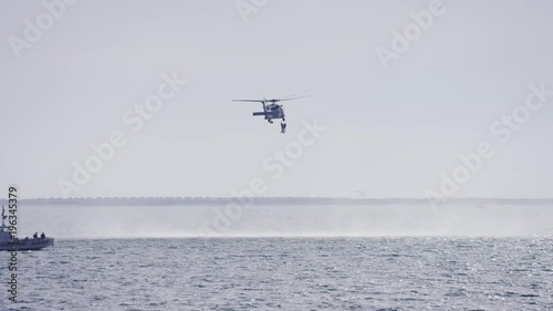Wallpaper Mural Helicopter performing a rescue over water Torontodigital.ca